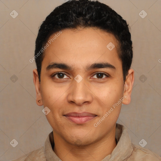 Joyful latino young-adult male with short  black hair and brown eyes