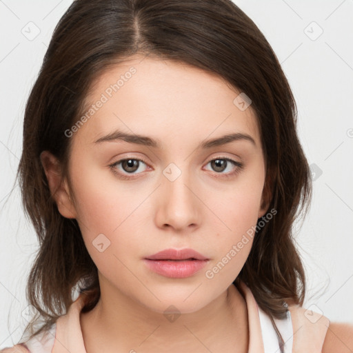 Neutral white young-adult female with medium  brown hair and brown eyes