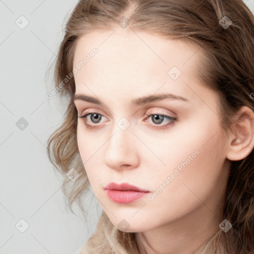 Neutral white young-adult female with long  brown hair and grey eyes