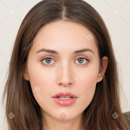 Neutral white young-adult female with long  brown hair and brown eyes