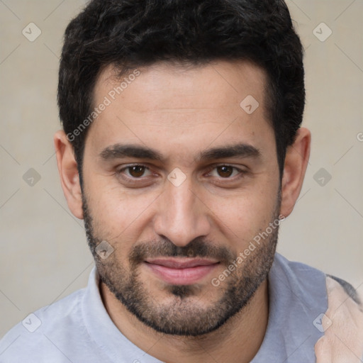 Joyful white young-adult male with short  black hair and brown eyes