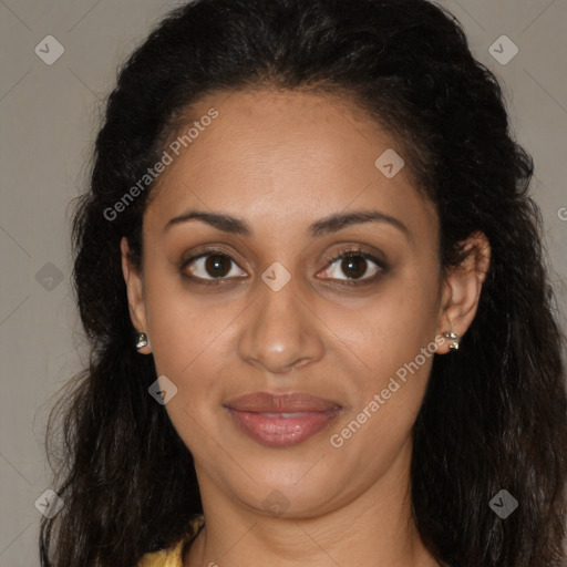 Joyful black young-adult female with long  brown hair and brown eyes