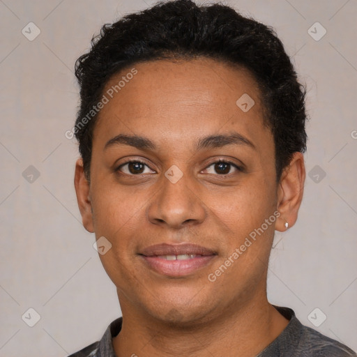 Joyful latino young-adult female with short  black hair and brown eyes