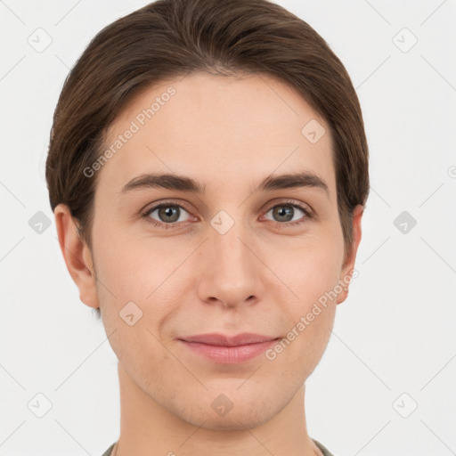 Joyful white young-adult female with short  brown hair and grey eyes