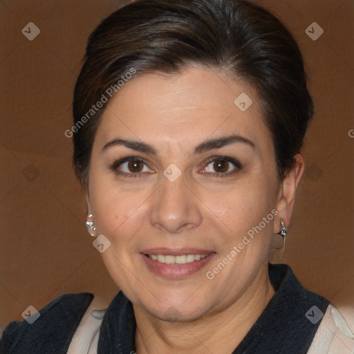 Joyful white adult female with medium  brown hair and brown eyes