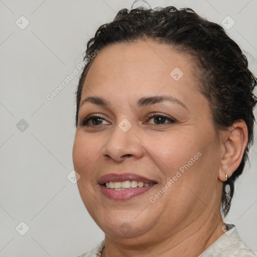 Joyful white adult female with short  brown hair and brown eyes