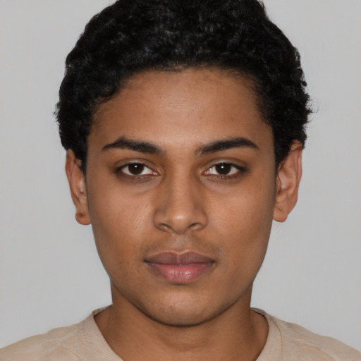 Neutral black young-adult female with short  black hair and brown eyes