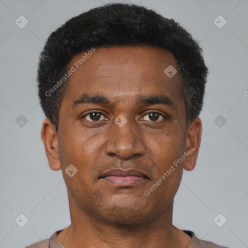 Neutral black young-adult male with short  black hair and brown eyes