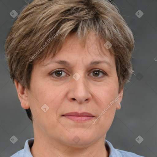 Joyful white adult female with short  brown hair and grey eyes