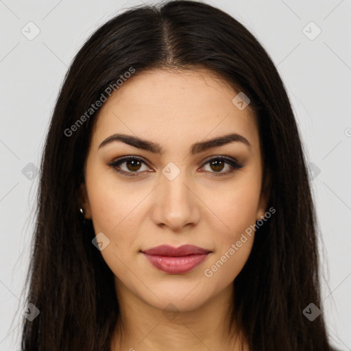 Joyful latino young-adult female with long  brown hair and brown eyes