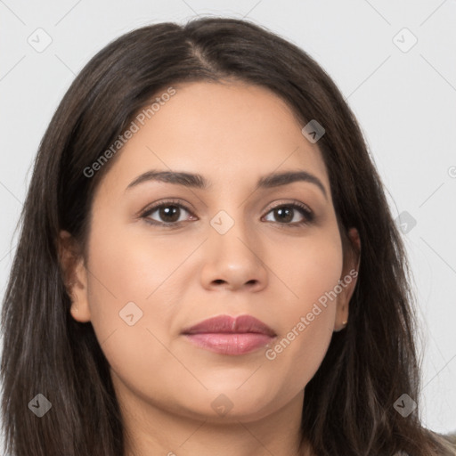 Joyful latino young-adult female with long  brown hair and brown eyes