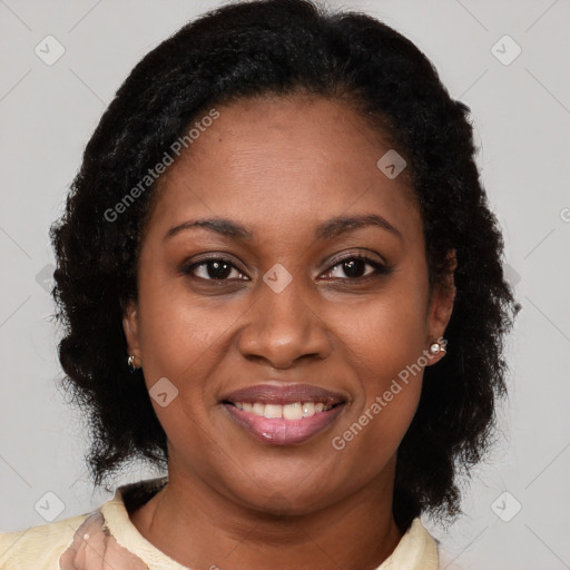 Joyful black young-adult female with medium  brown hair and brown eyes