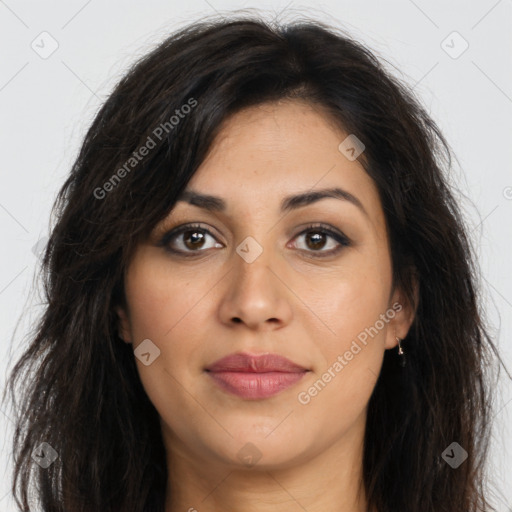 Joyful latino young-adult female with long  brown hair and brown eyes