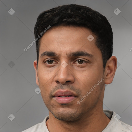 Neutral latino young-adult male with short  black hair and brown eyes