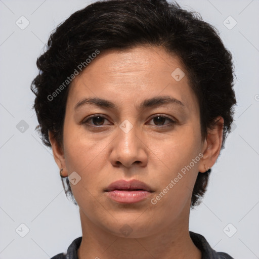 Joyful white adult female with short  brown hair and brown eyes