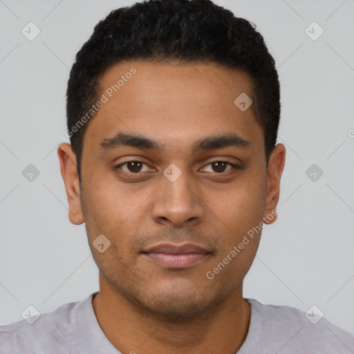 Neutral latino young-adult male with short  black hair and brown eyes