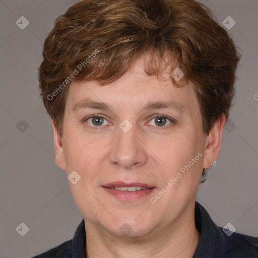 Joyful white adult male with short  brown hair and grey eyes