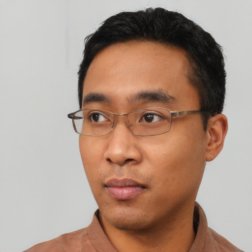 Neutral asian young-adult male with short  black hair and brown eyes