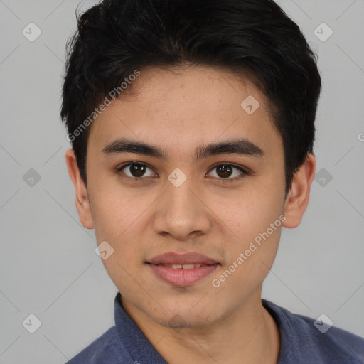 Joyful asian young-adult male with short  black hair and brown eyes