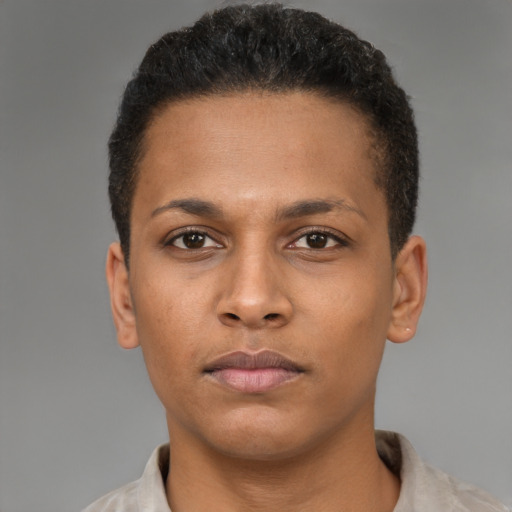 Neutral latino young-adult male with short  brown hair and brown eyes