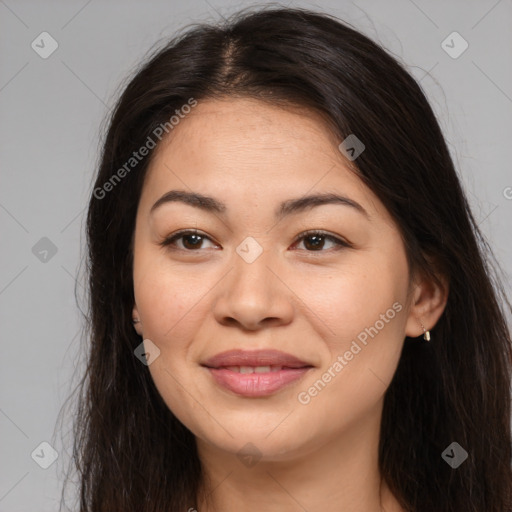 Joyful asian young-adult female with long  brown hair and brown eyes