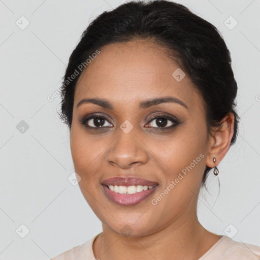 Joyful latino young-adult female with medium  brown hair and brown eyes