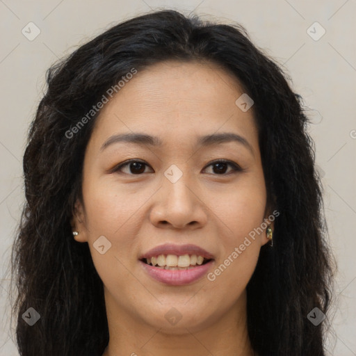 Joyful asian young-adult female with long  brown hair and brown eyes