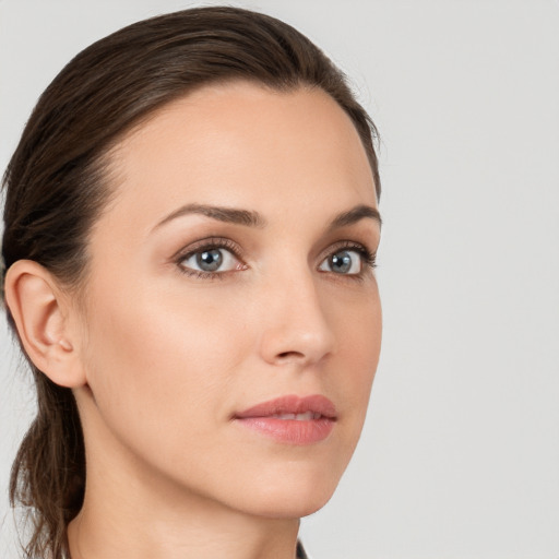 Neutral white young-adult female with medium  brown hair and grey eyes