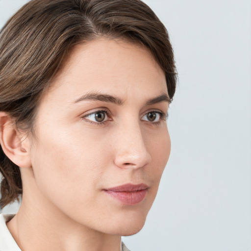 Neutral white young-adult female with medium  brown hair and grey eyes