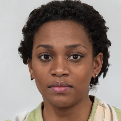 Neutral black young-adult female with short  brown hair and brown eyes