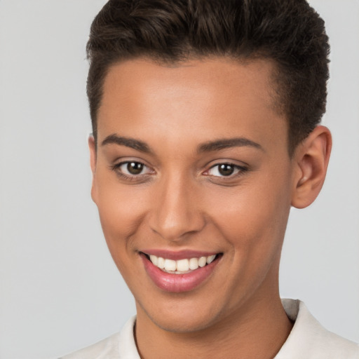 Joyful white young-adult female with short  brown hair and brown eyes