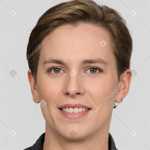 Joyful white young-adult female with short  brown hair and grey eyes