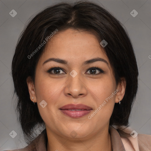 Joyful latino adult female with medium  brown hair and brown eyes