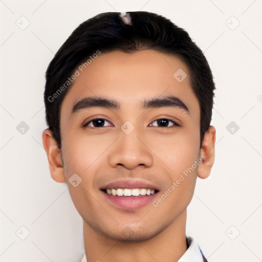 Joyful latino young-adult male with short  black hair and brown eyes