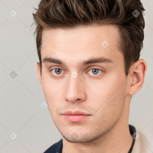 Neutral white young-adult male with short  brown hair and grey eyes