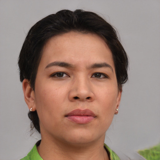 Joyful asian young-adult female with short  brown hair and brown eyes