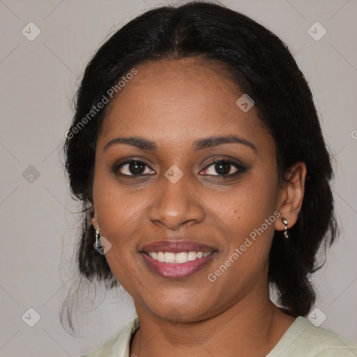 Joyful black young-adult female with medium  black hair and brown eyes