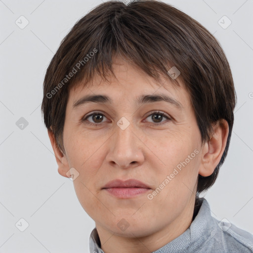 Joyful white adult female with short  brown hair and brown eyes