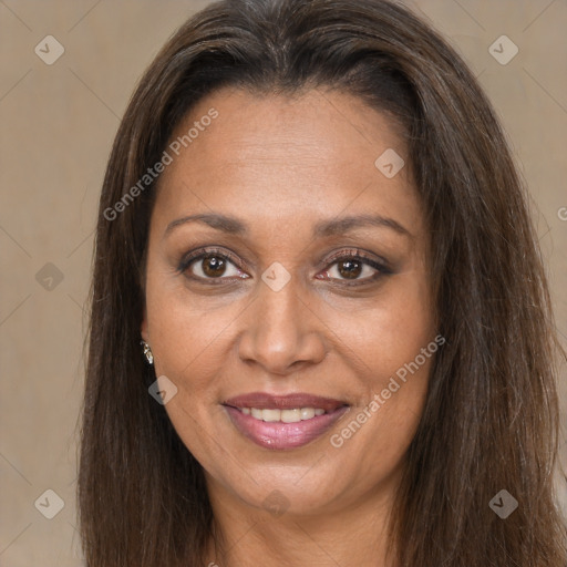 Joyful white adult female with long  brown hair and brown eyes