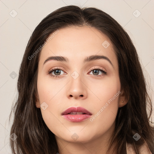 Neutral white young-adult female with long  brown hair and brown eyes