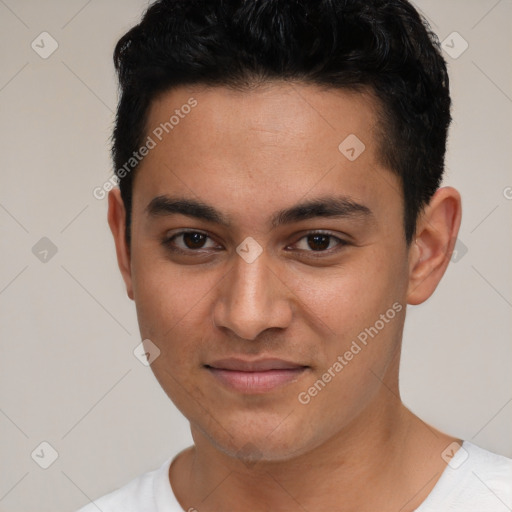 Joyful white young-adult male with short  black hair and brown eyes