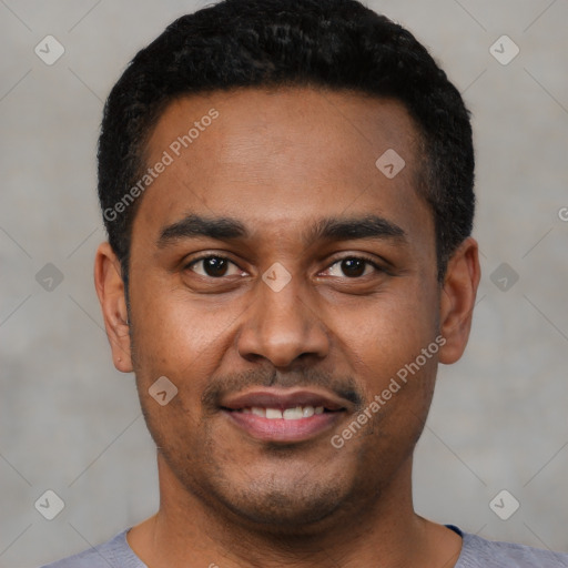 Joyful latino young-adult male with short  black hair and brown eyes