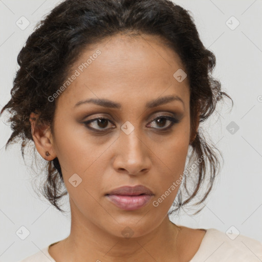 Joyful black young-adult female with medium  brown hair and brown eyes