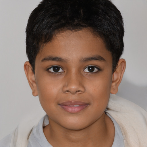 Joyful latino child female with short  brown hair and brown eyes