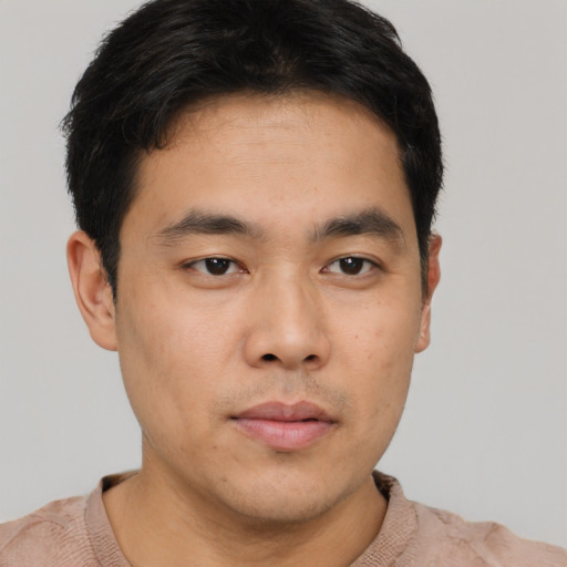 Neutral asian young-adult male with short  brown hair and brown eyes
