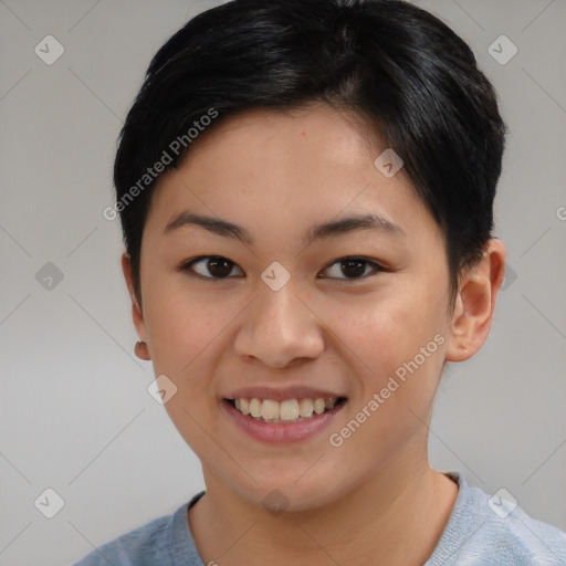 Joyful asian young-adult female with short  brown hair and brown eyes