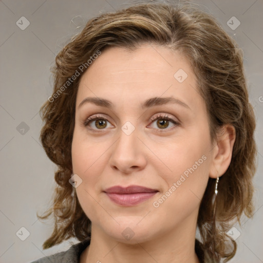 Joyful white young-adult female with medium  brown hair and green eyes