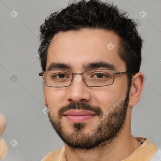 Neutral white young-adult male with short  black hair and brown eyes