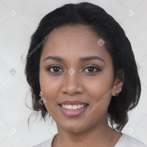 Joyful latino young-adult female with medium  black hair and brown eyes