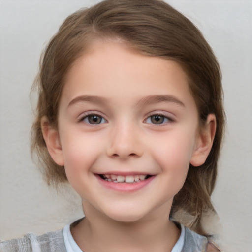 Joyful white child female with medium  brown hair and brown eyes